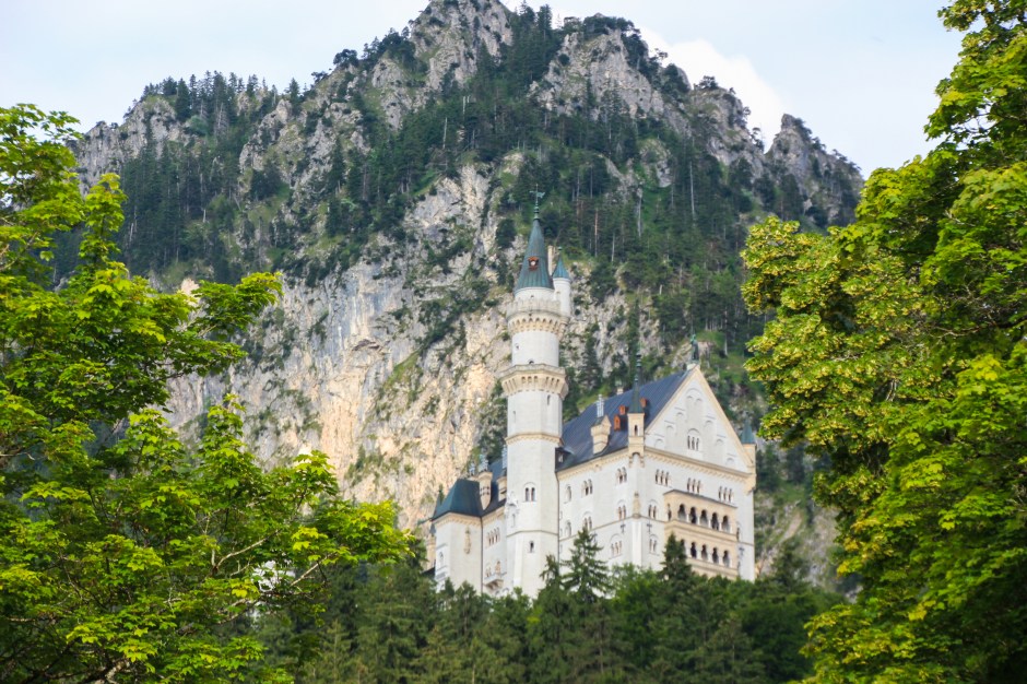 A glimpse of Neuschwanstein Castle from the town of Hohenschwangau below. Bavaria, 2015 