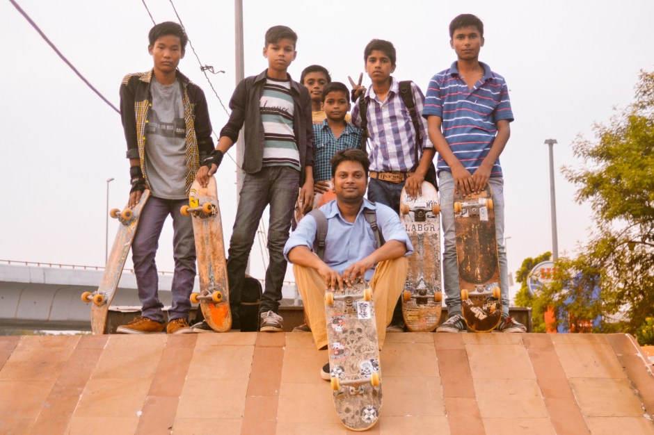 ​The Free Motion Skatepark "Sunday Morning Crew" poses for a photograph at the top of their DIY wooden ramp in New Delhi, India.